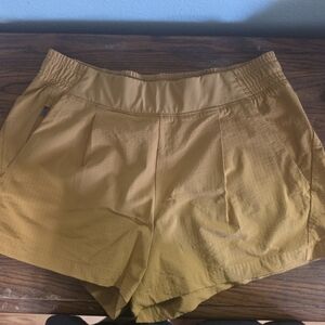 Athleta Mustard Yellow Athletic Shorts